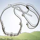 Howlite Necklace With Ohm Silver Disc Bead - tsneck003